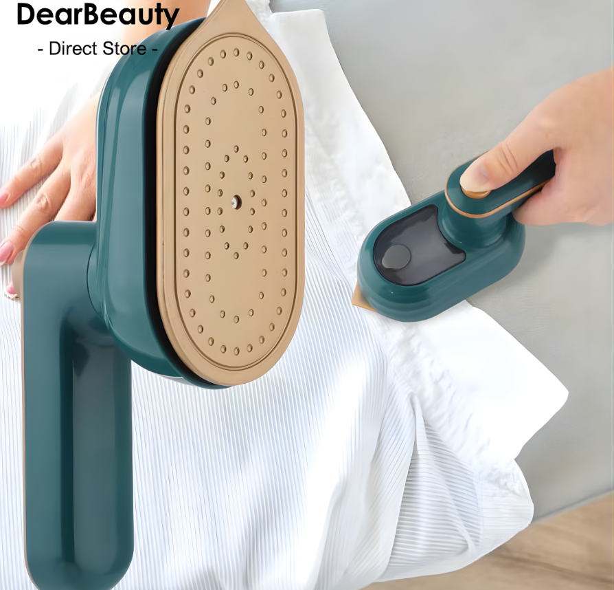 Mini Handheld Steam Iron being used to remove wrinkles from a shirt on a tabletop.